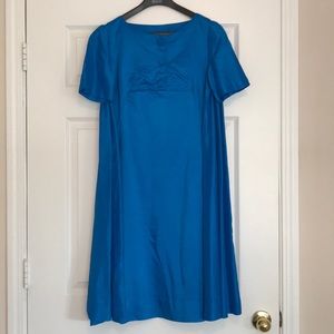 Vintage Shiny blue dress with side pleating.